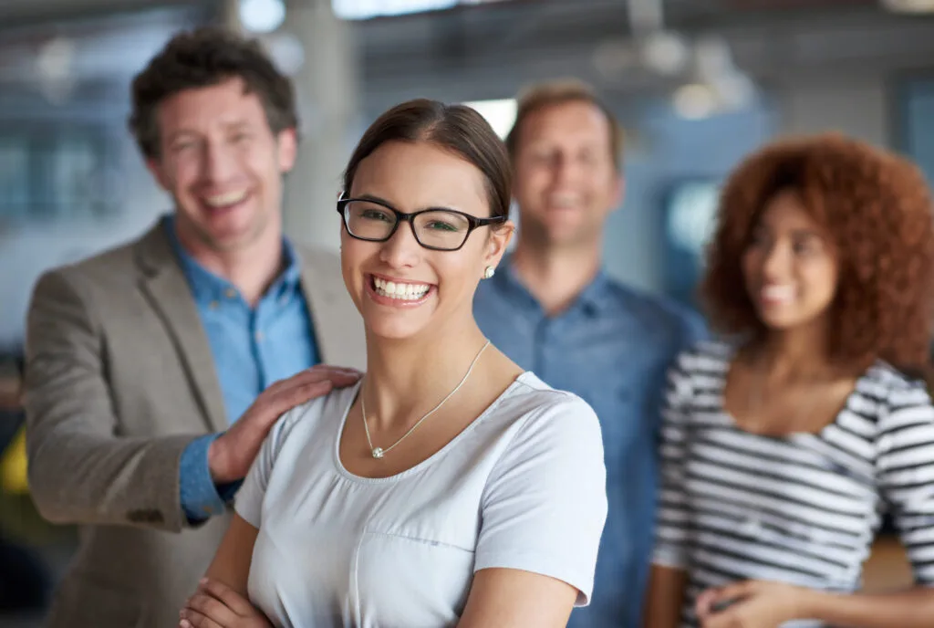 on recriute ! Comptable female leader confident team diversity portrait office support solidarity teamwork woman group hand shoulder motivation coworking assistance workplace